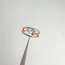 Load and play video in Gallery viewer, 5 x 7 mm. Oval Cut Sky Blue Brazilian Topaz with Cz Accent Ring
