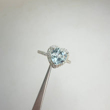Load and play video in Gallery viewer, 8 mm. Heart Cut Sky Blue Brazilian Topaz with Cz Halo Ring
