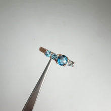 Load and play video in Gallery viewer, 5 mm. Round Cut London Blue Brazilian Topaz Cluster Ring
