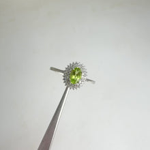 Load and play video in Gallery viewer, 4 x 6 mm. Oval Cut Green Pakistani Peridot with Cz Halo Ring
