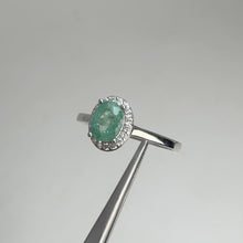 Load and play video in Gallery viewer, 5 x 7 mm. Oval Cut Green Zambian Emerald with Cz Halo Ring (Blemished)
