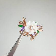 Load and play video in Gallery viewer, 11 mm. Carved Flower White Mother of Pearl with Cz Accents Ring
