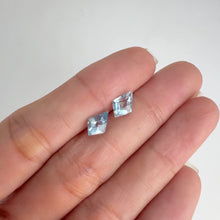 Load and play video in Gallery viewer, Pair of  6 x 9 mm. Kite Cut Sky Blue Brazilian Topaz
