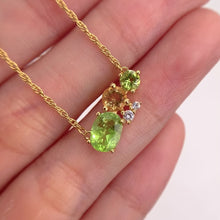Load and play video in Gallery viewer, 6 x 8 mm. Oval Cut Green Pakistani Peridot and Citrine with Cz Accents Cluster Necklace
