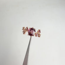 Load and play video in Gallery viewer, Handmade 7 x 8 mm. Oval Cut Pink Tanzanian Zircon and Sapphire Cluster Ring
