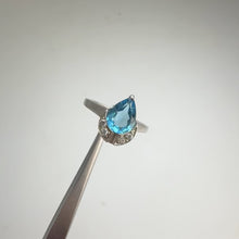 Load and play video in Gallery viewer, 6 x 8 mm. Pear Cut Blue Brazilian Topaz with Cz Accents Ring
