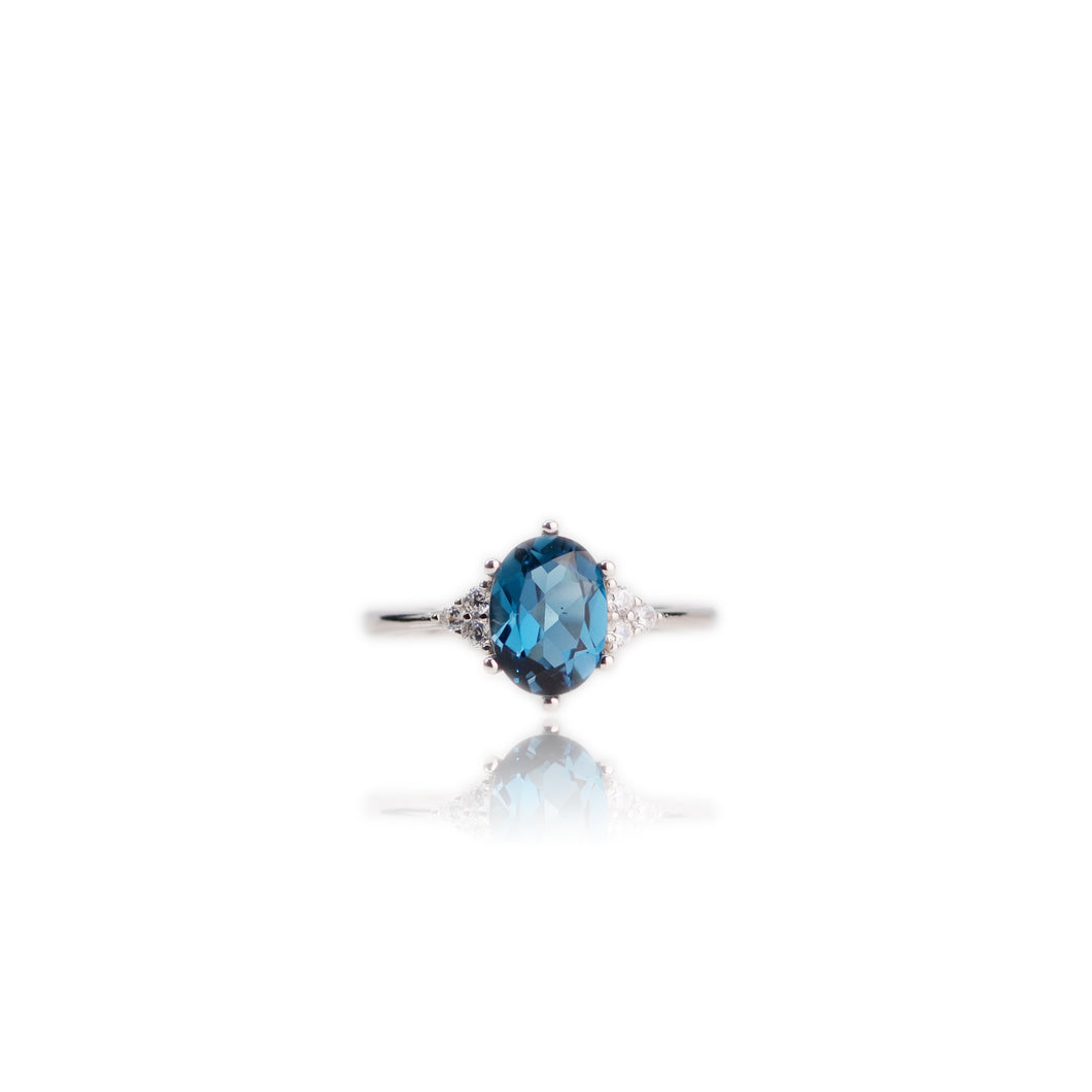 6 x 8 mm. Oval Cut London Blue Brazilian Topaz with Cz Accents Ring