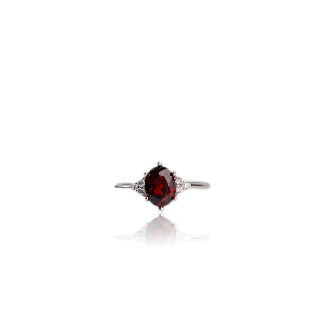 6 x 8 mm. Oval Cut Red African Garnet with Cz Accents Ring