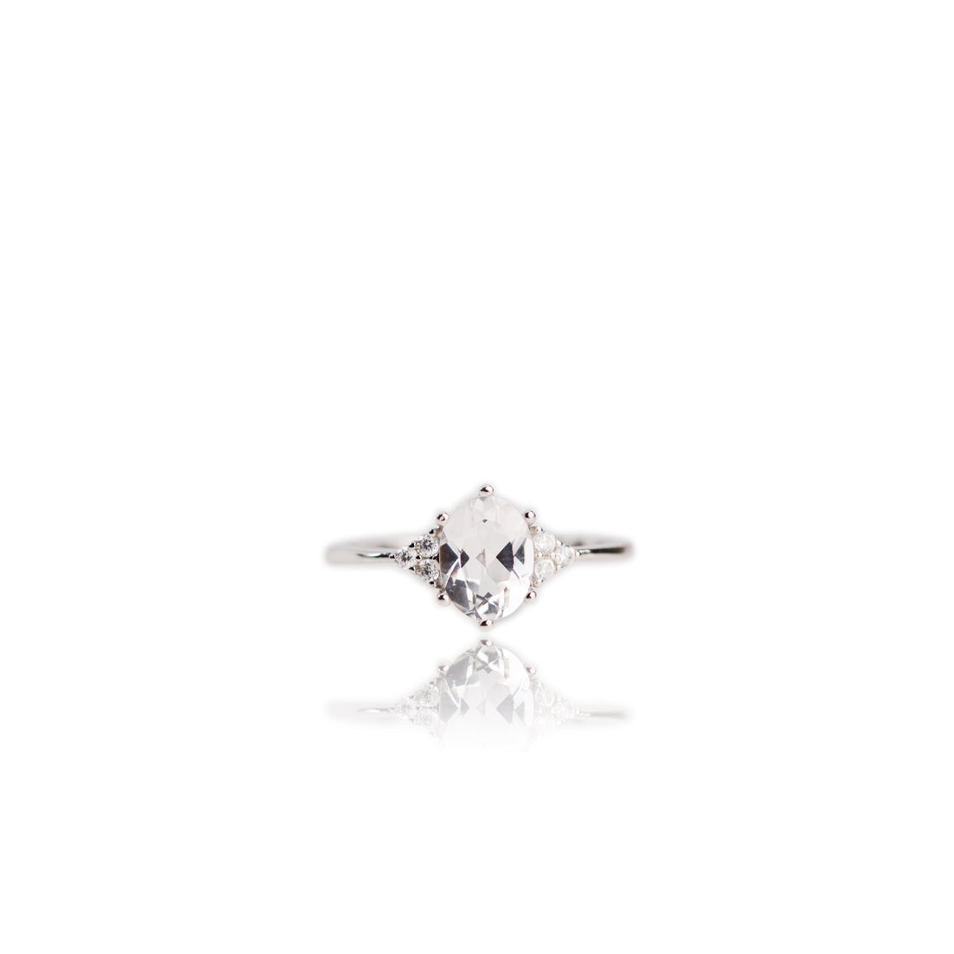 6 x 8 mm. Oval Cut White Brazilian Topaz with Cz Accents Ring