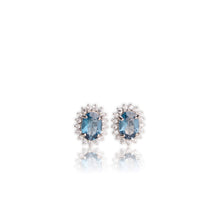 Load image into Gallery viewer, 5 x 7 mm. Oval Cut London Blue Brazilian Topaz with Cz Accents Earrings

