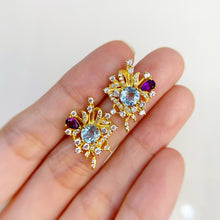Load image into Gallery viewer, 6 mm. Round Cut Sky Blue Brazilian Topaz and Amethyst with Cz Accents Earrings

