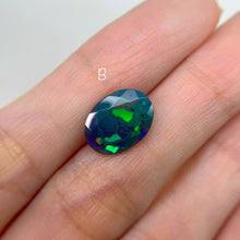 Load image into Gallery viewer, 9 x 13 mm. Oval Cut Black Ethiopian Opal
